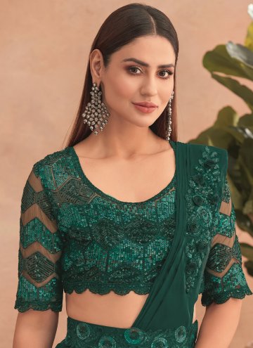Green color Net Ruffle Saree with Embroidered
