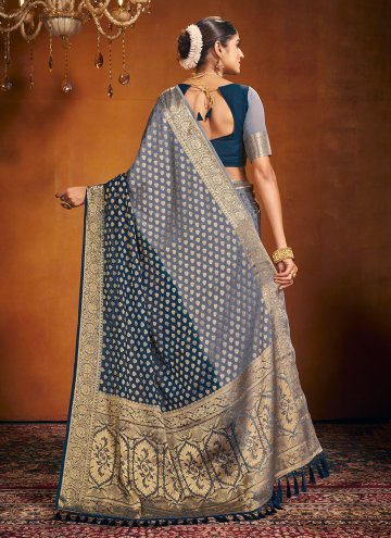 Grey and Teal color Woven Pure Georgette Classic Designer Saree