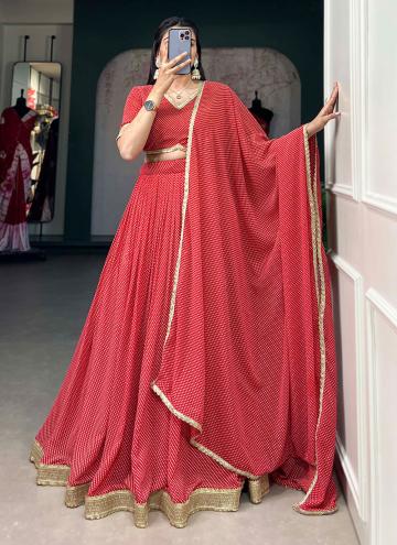 Georgette Designer Lehenga Choli in Red Enhanced with Lace