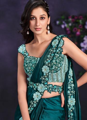 Satin Silk Trendy Saree in Morpeach Enhanced with Moti Work